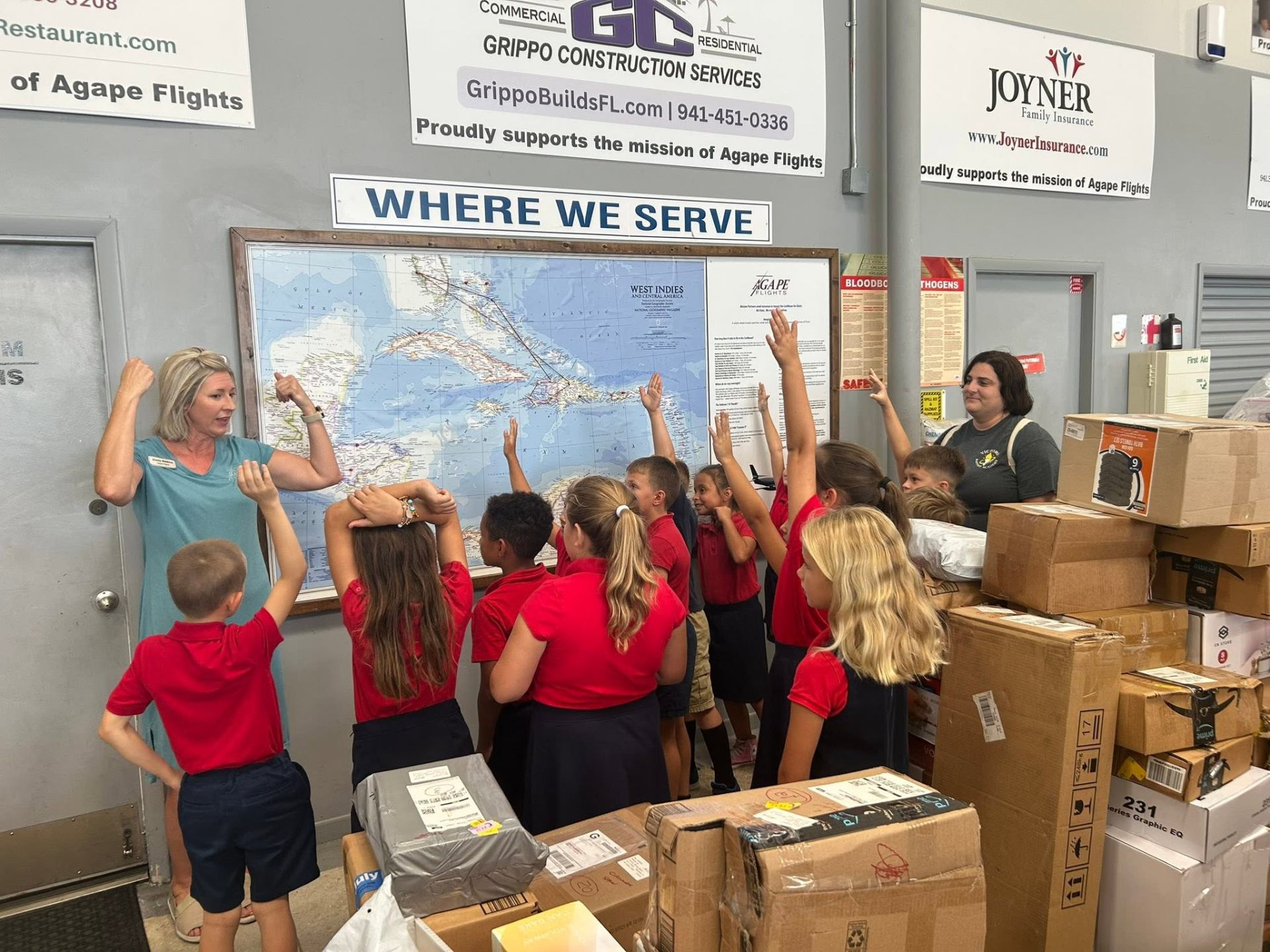 VBA students learning about mission work at Agape Flights